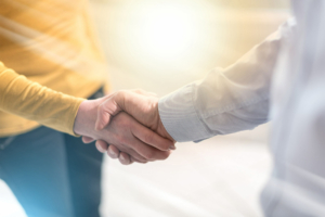 Two people shaking hands